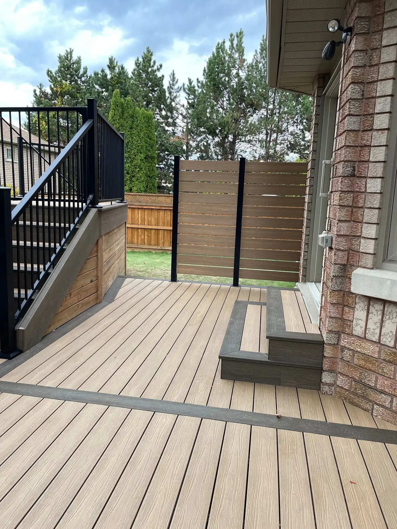 Composite decking boards and railing detail
