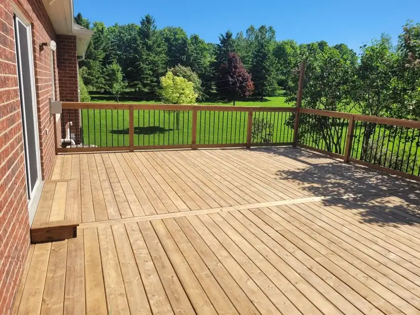 Completed deck project by Custom Home Works